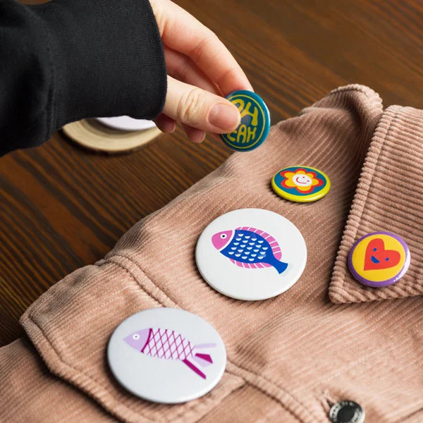 Custom enamel pin mockup showing detailed design